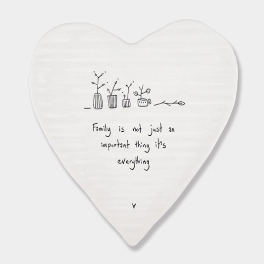 Family is everything white coaster on white background