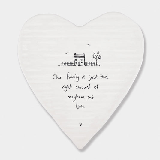 White porcelain heart with family saying in black