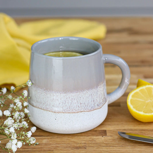 grey mojave mug with lemon and flowers
