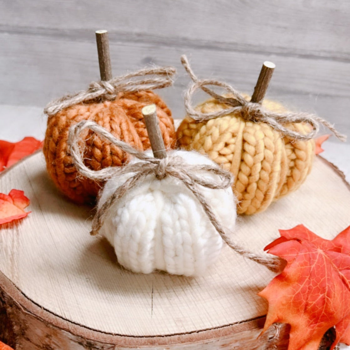 Warm Yellow Knitted Pumpkin with Wooden Stem