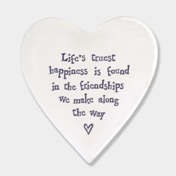 Life's Truest Happiness Quote on white coaster and white background