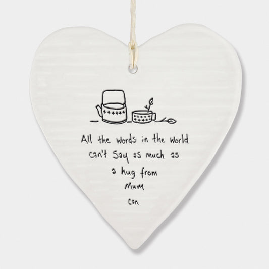 White wobbly porcelain heart with mum saying in black 