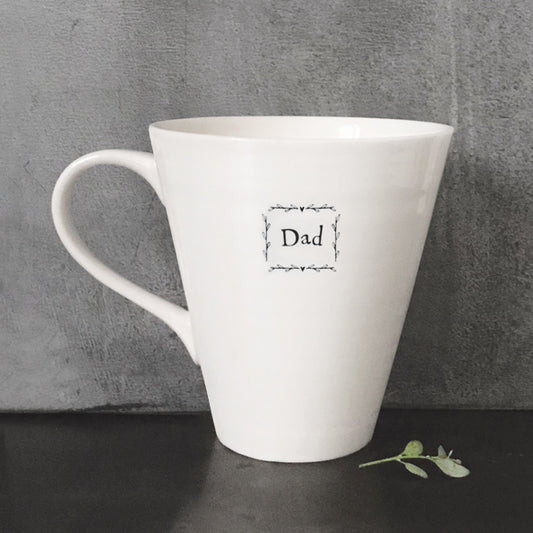 Dad white porcelain mug from East of India with a grey background