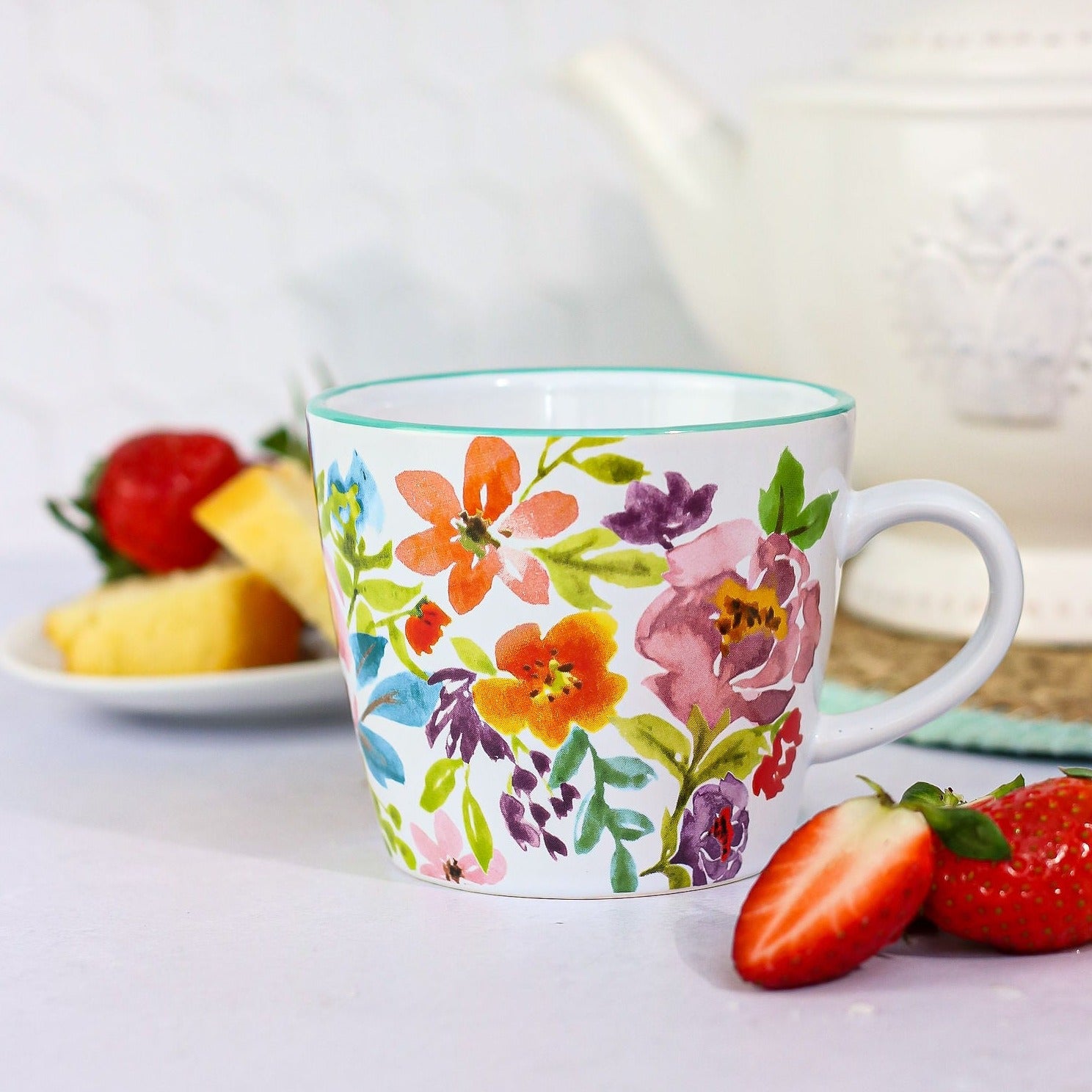 floral mug with strawberries and teapot 