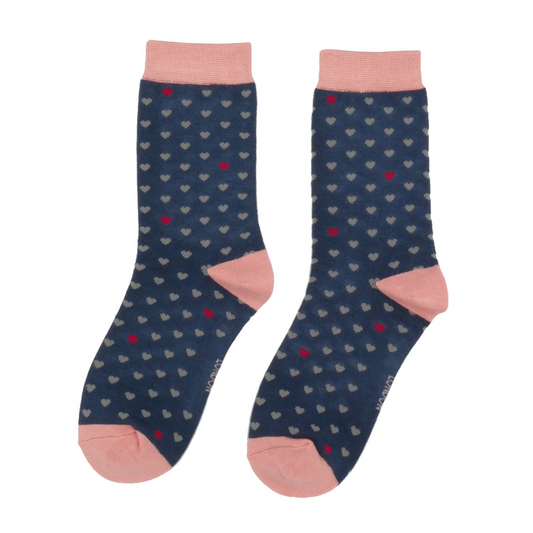 navy and pink heart socks on a white background